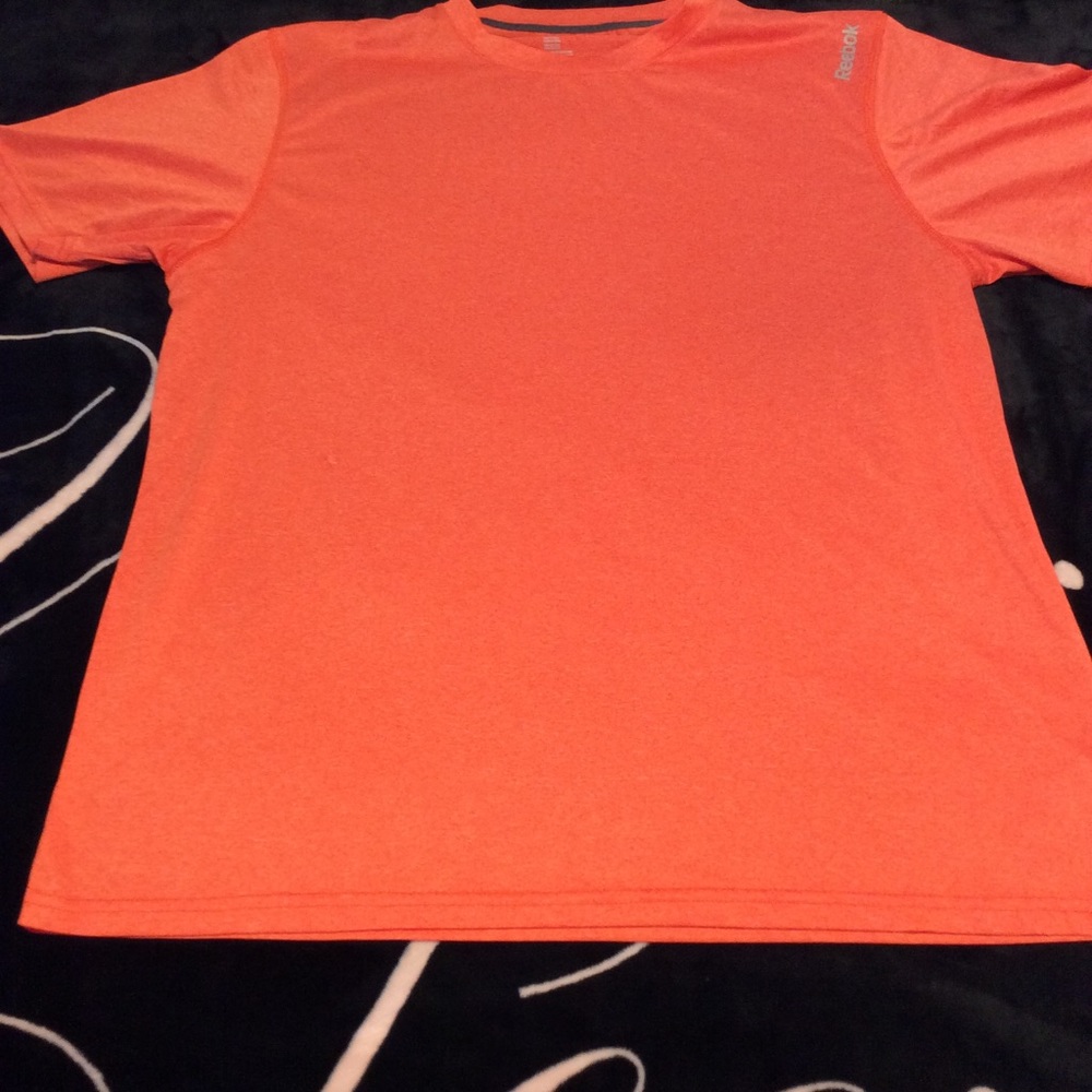 Reebok shirt quick dry material. Only worn once.